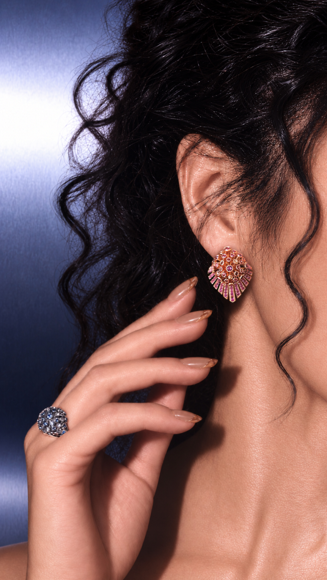 Gemstone fan earring and ring, close-up
